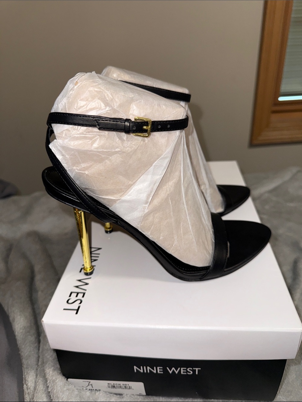 Nine West Black and Gold Stiletto Ankle-Strap Sandals